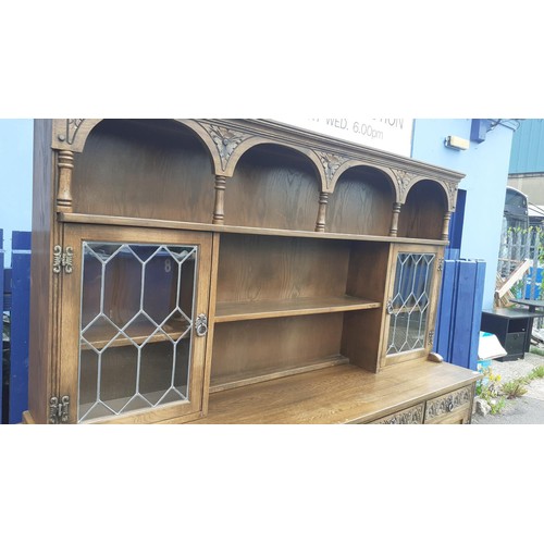 761 - AN ARCHED TOP OLD CHARM DRESSER WITH 2 LEADED GLASS DOORS 73 X 73 X 19IN