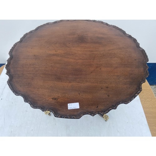 598 - A HEAVY PIE CRUST TILT TOP TABLE