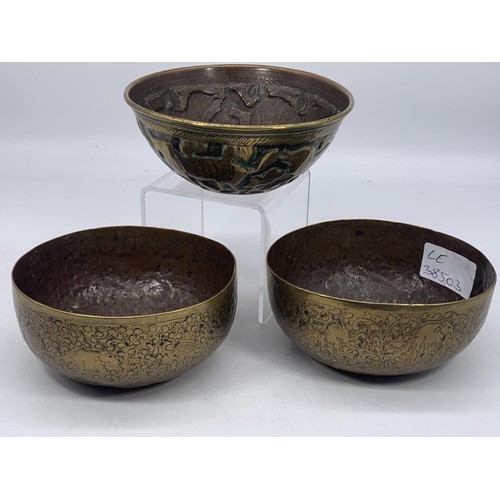 725 - 2 INDIAN BRASS SINGING BRASS BOWLS AND AN EMBOSSED INDIAN BOWL