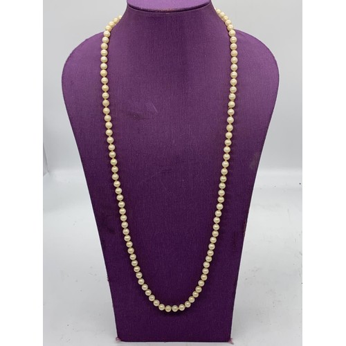 208 - 2 STRING OF PEARLS ONE WITH 9ct GOLD FITTINGS