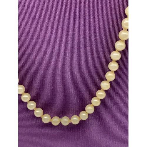 208 - 2 STRING OF PEARLS ONE WITH 9ct GOLD FITTINGS