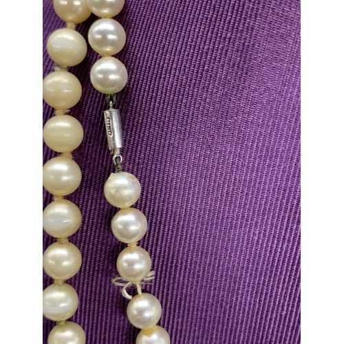 208 - 2 STRING OF PEARLS ONE WITH 9ct GOLD FITTINGS