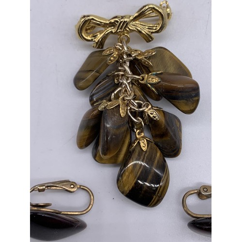 222 - A TIGERS EYE EARRINGS AND BROOCH SET