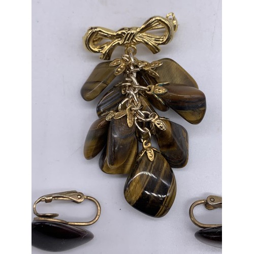 222 - A TIGERS EYE EARRINGS AND BROOCH SET