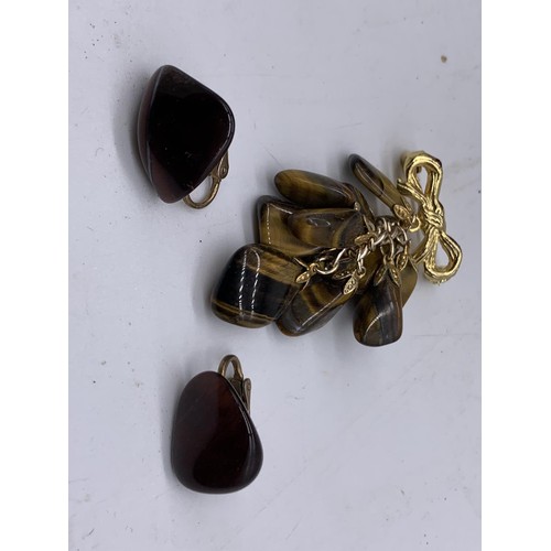 222 - A TIGERS EYE EARRINGS AND BROOCH SET