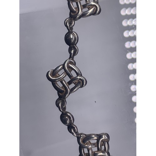 223 - A SILVER CELTIC BRACELET