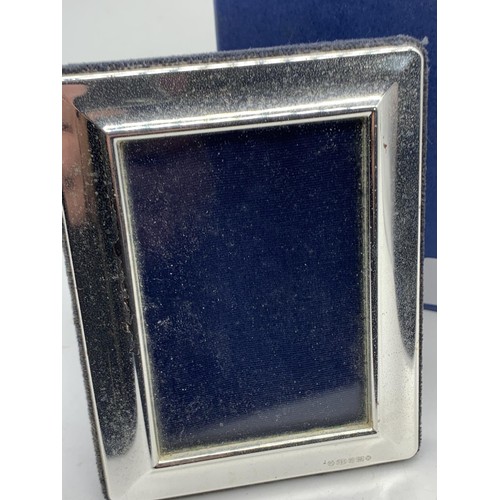 224 - A SILVER PHOTO FRAME 5X3.5