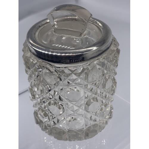 226 - AN ANTIQUE CUT GLASS JAR WITH A SILVER TRIM WITH A GLASS STOPPER