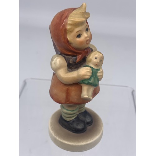 231 - A HUMMELL FIGURE GIRL WITH DOLL 3.5