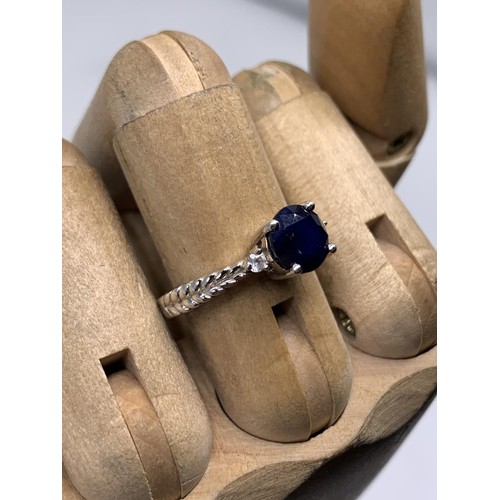 240 - A SILVER SAPPHIRE RING