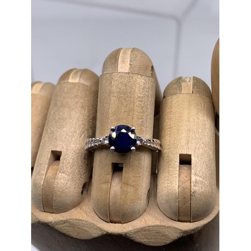 240 - A SILVER SAPPHIRE RING