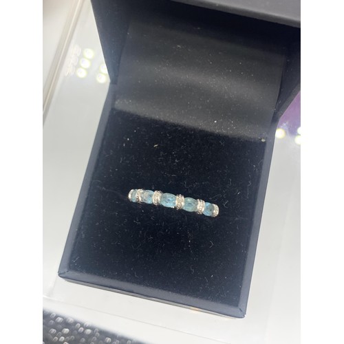 660 - A 9ct WHITE GOLD DIAMOND AND TOPAZ RING size N 2.1grms