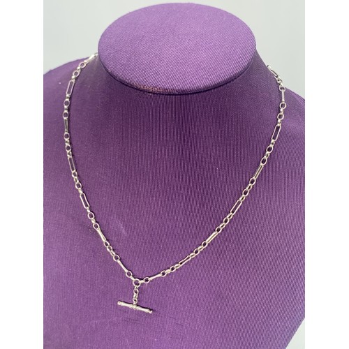 260 - A SILVER LOOP NECKLACE WITH T BAR