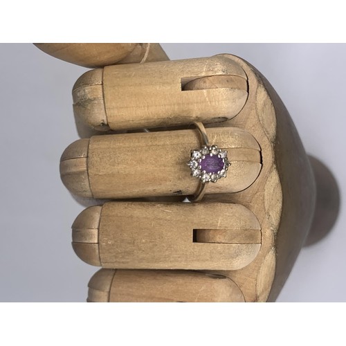 270 - A SILVER AMETHYST & GEM  SET RING