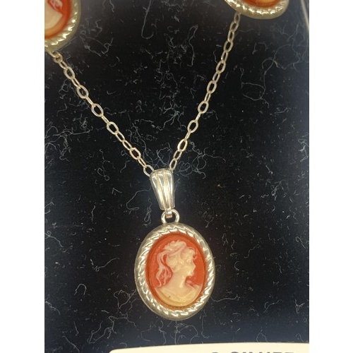 277 - A SILVER CAMEO NECKLACE AND EARRING SET