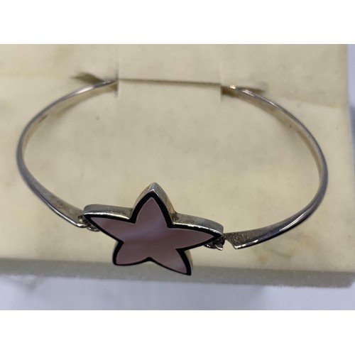 258 - A SILVER AND M.O.P- STAR BRACELET