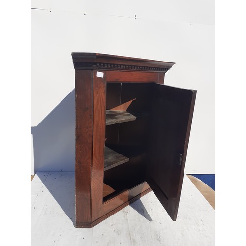 102 - A SMALL ANTIQUE OAK HANGING CORNER CUPBOARD 35x29in