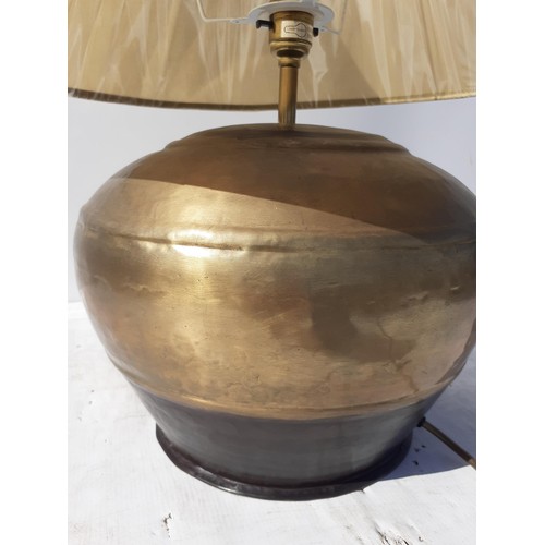 111 - A COPPER FINISH TABLE LAMP WITH SHADE