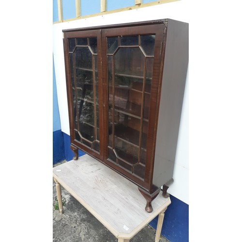 42 - A 2 DOOR MAHOGANY DISPLAY/BOOKCASE