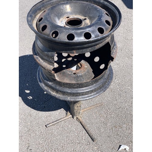 129 - A CAR  WHEEL FIREPIT