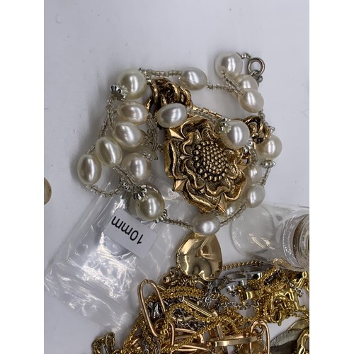 63 - A BAG OF MIXED COSTUME JEWELLERY