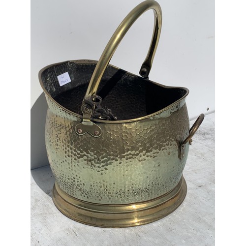 85 - A DIMPLED BRASS COAL SCUTTLE