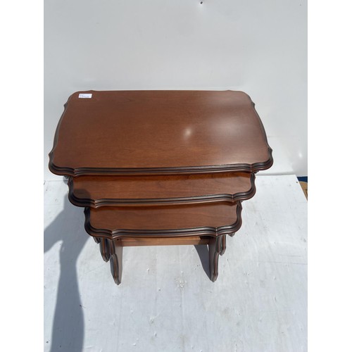 88 - A MAHOGANY NEST OF 3 TABLES