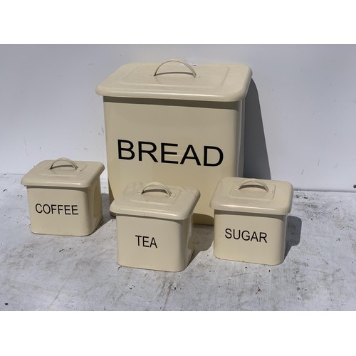 170 - A CREAM METAL KITCHEN SET COMPRISING BREADBIN TEA COFFEE AND SUGAR