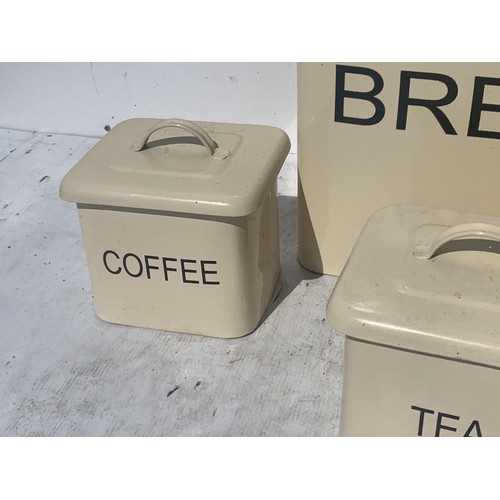 170 - A CREAM METAL KITCHEN SET COMPRISING BREADBIN TEA COFFEE AND SUGAR