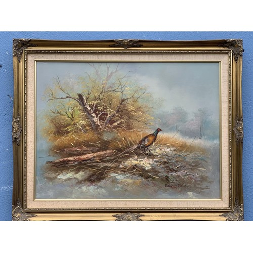 179 - GILT FRAMED SIGNED OIL PHEASANT IN THE FOREST 23X29