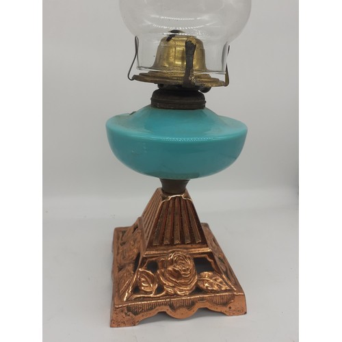 180 - A COTTAGE OIL LAMP ON COPPER BASE 18in