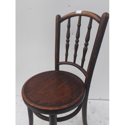 322 - AN ORNATE BENTWOOD CHAIR