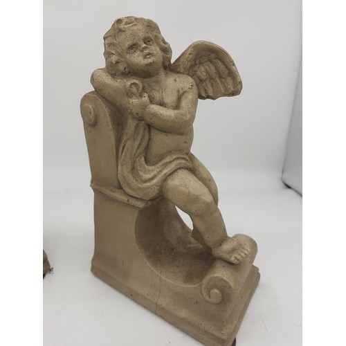 184 - A SET OF CHERUB BOOKENDS 8in