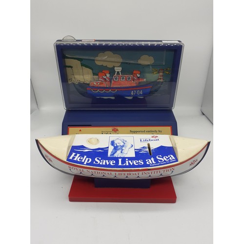 191 - 2 VINATGE RNLI MONEY BOX