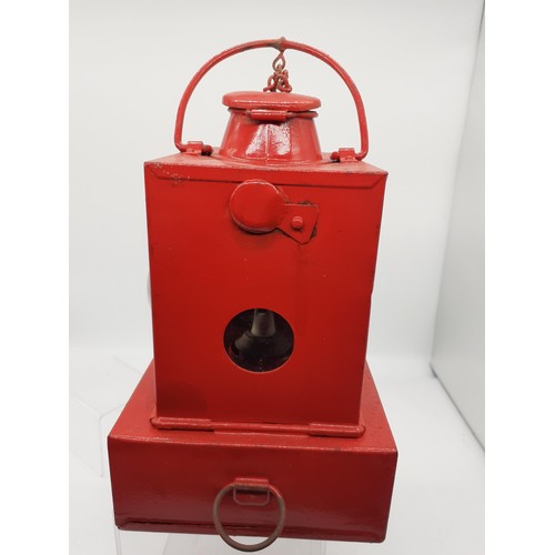 380 - A RED PAINTED LITTON LAMP