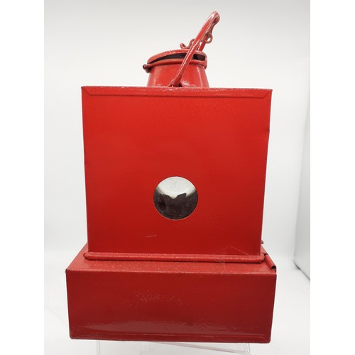 380 - A RED PAINTED LITTON LAMP