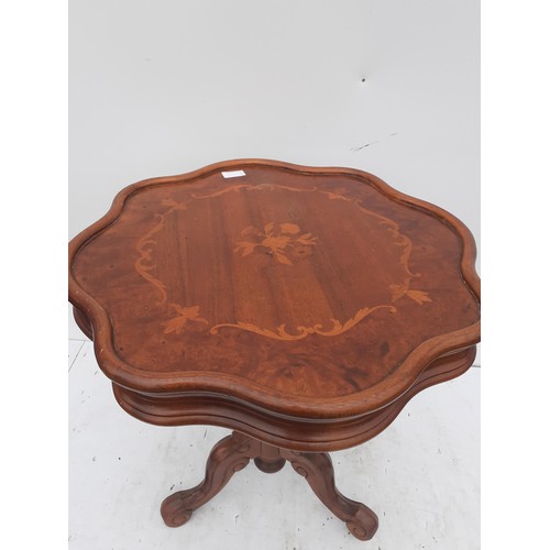 291 - A SHAPED WALNUT STYLE MARQ TABLE