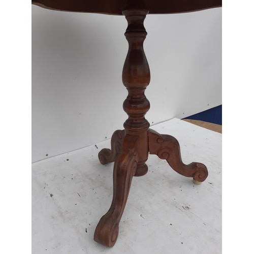 291 - A SHAPED WALNUT STYLE MARQ TABLE