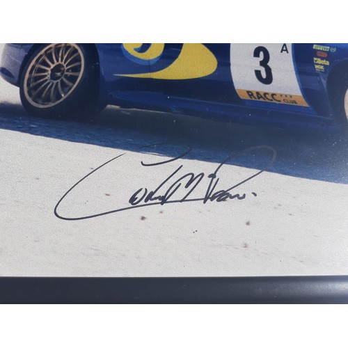 427 - A SIGNED COLIN McCREA  SUBARU FRAMED PHOTO 24X16