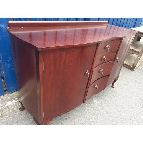 464 - A 2 DOOR 4 DRAWER SIDEBOARD BY DUFFS OF LISBURN