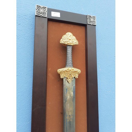 483 - A LARGE ORNAMENTAL SWORD MOUNTED 46x11