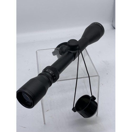 779 - A RIFLE SCOPE