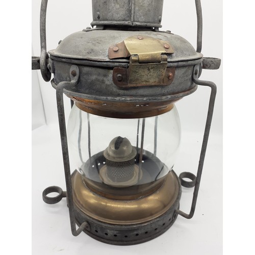 498 - A BRASS AND METAL SHIPS KEROSENE LANTERN 14in