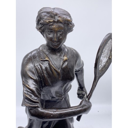 513 - A BRONZE LADY OF TENNIS ON MARBLE BASE 16