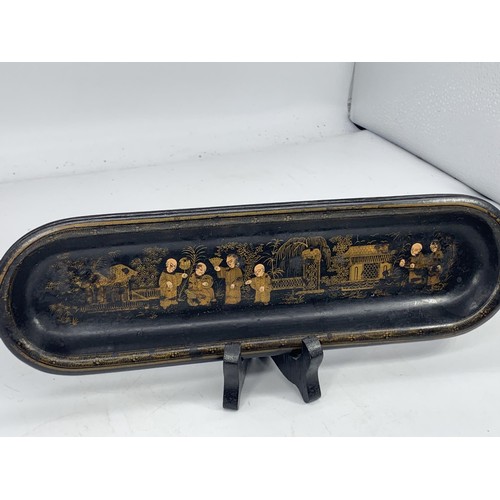 571 - A PAPERMACHET PEN TRAY WITH HAND PIANTED IN GILT ORIENTAL FIGURES 11X3