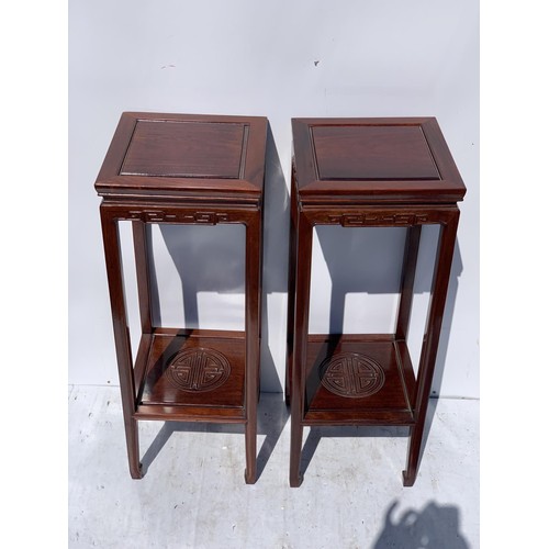 588 - A PAIR OF MAHOGANY ORIENTAL STAND SIDE TABLES