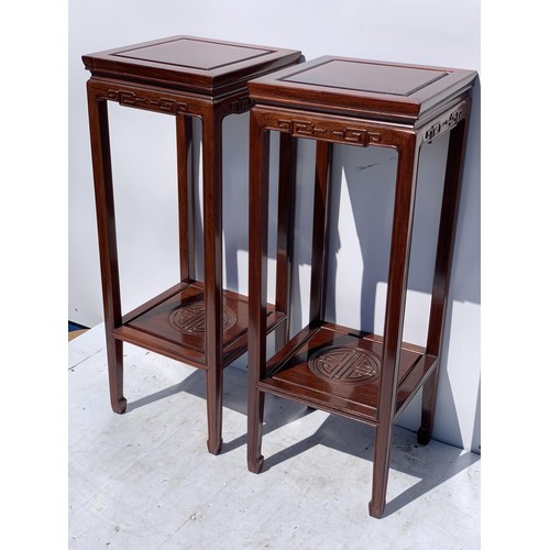 588 - A PAIR OF MAHOGANY ORIENTAL STAND SIDE TABLES