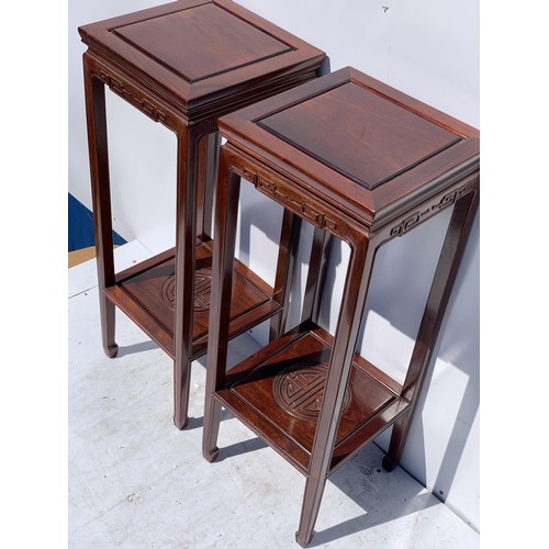 588 - A PAIR OF MAHOGANY ORIENTAL STAND SIDE TABLES