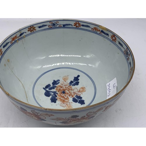 596 - A CHINESE PORCELAIN BOWL WITH LOTUS FLOWER DESIGN (HAIRLINE CRACKS) 8in Dia