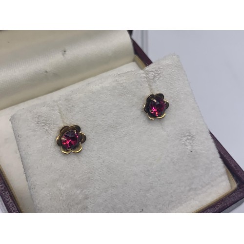 643 - A PAIR OF 9ct OLD GARNET SET EARRINGS